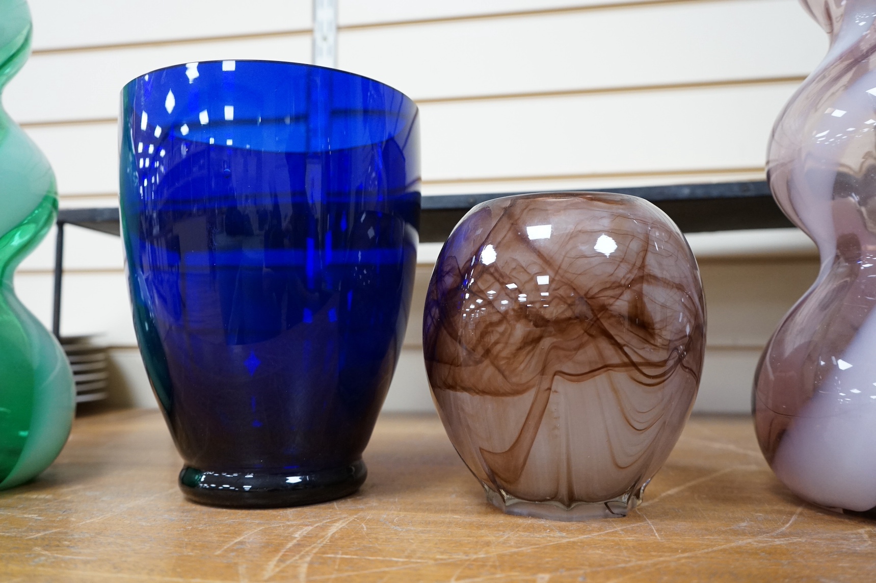 Two Italian Empoli glass bottles and two other vases, largest 40cm high. Condition - good